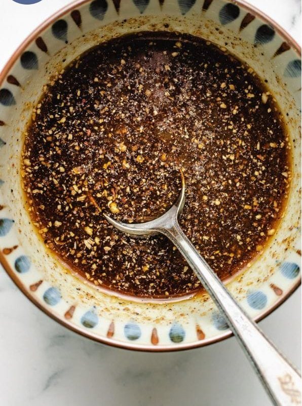 chicken cooking in black pepper sauce